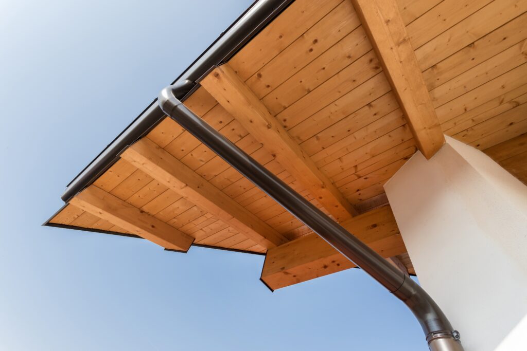 Rain gutter on the roof ecological house